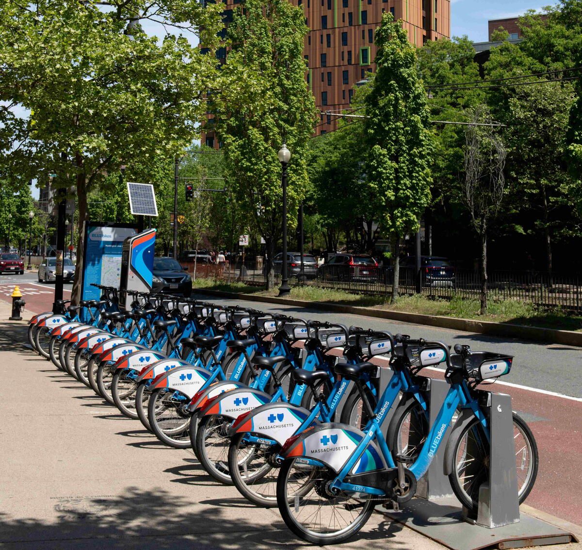 Photo of bluebikes lined up at a rack on Huntington Avenue