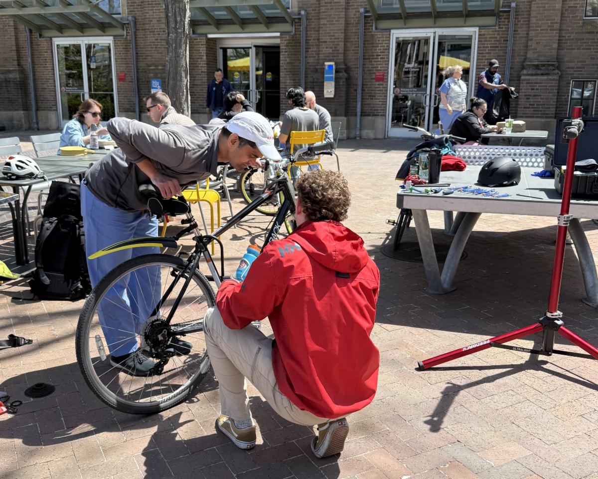 bike mechanic checks out employee's bike